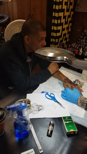 Explore simple funny tattoo ideas, creative tattoo ideas in Lebanon, available at Erik Gwynns Beneath the Skin Tattooing & Piercing