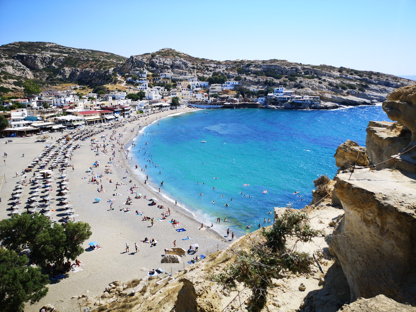 Photo of Matala beach with gray fine pebble surface