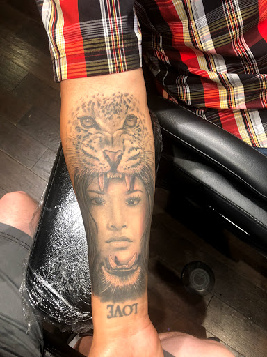 Explore cute ghost tattoo ideas, creative tattoo ideas in Mesa, available at The Tattoo Lounge