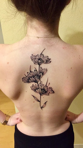 Explore french tattoo ideas, creative tattoo ideas in Winter Park, available at Beyond Ink Tattoo & Body Piercing