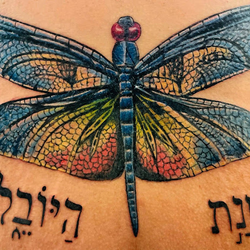 Explore scoliosis tattoo ideas, creative tattoo ideas in College Station, available at The Ineffable Tattoo Experience