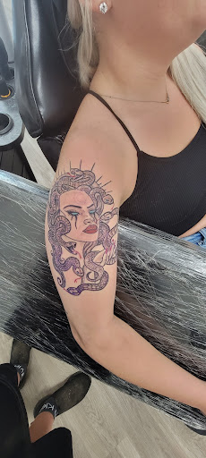 Explore beach tattoo ideas for guys, creative tattoo ideas in Conway, available at Primal Urge Tattoos