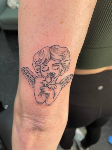 Explore small biblical tattoo ideas, creative tattoo ideas in Denison, available at Calypso Tattoo