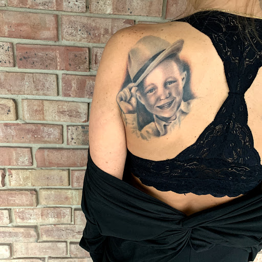 Explore first child tattoo ideas for dad, creative tattoo ideas in Tallmadge, available at Killjoy tattoo