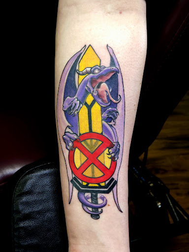 Explore mic tattoo ideas, creative tattoo ideas in Caldwell, available at Blue Ring Studio Tattoo & Piercing