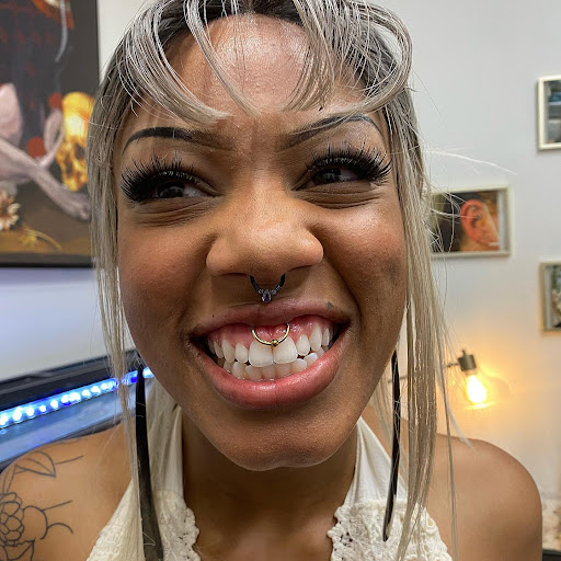 Explore full neck tattoo ideas for men, creative tattoo ideas in Cary, available at Fine Art Body Piercing By Lilith Mae