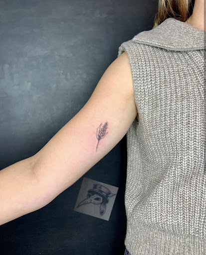 Explore small cardinal tattoo ideas, creative tattoo ideas in New Orleans, available at Catahoula Tattoo 