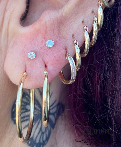 Explore haunted house tattoo ideas, creative tattoo ideas in Garden Grove, available at CM Hurt Piercing & Jewelry