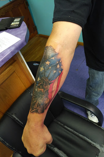 Explore nail tech tattoo ideas, creative tattoo ideas in Lima, available at White Wizard Tattoo & Body Piercing