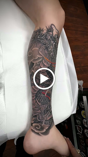 Explore tattoo leg ideas, creative tattoo ideas in Seattle, available at Dragon Tattoo