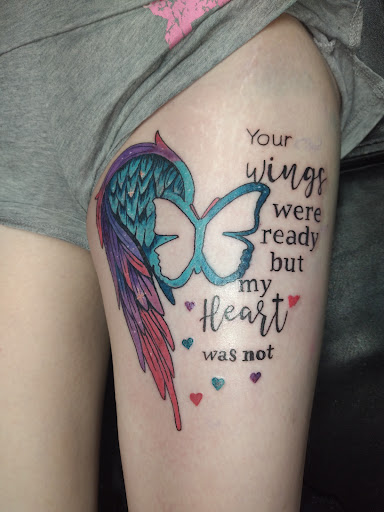 Explore front of neck tattoo ideas, creative tattoo ideas in Kewanee, available at Splat Ink tattoos and piercings