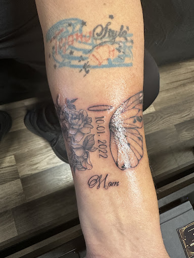 Explore bouquet tattoo ideas, creative tattoo ideas in Glendale, available at Urban Legends Tattoo and Piercing LLC