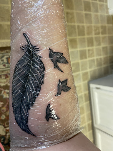 Explore ghost tattoo ideas, creative tattoo ideas in Smithfield, available at Combine Mindz Tattoo Production LLC