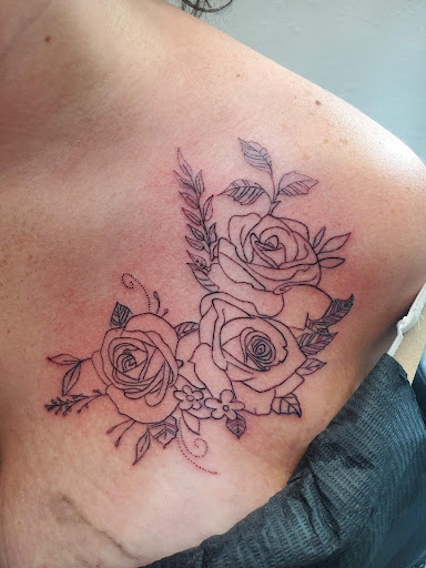 Explore rose tattoo ideas for women, creative tattoo ideas in Salem, available at Outwest Tattoo and body piercing ,30 years of tattooing,only life time guarantee