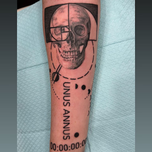 Explore cool tattoo ideas for wrist, creative tattoo ideas in Marietta, available at The Queen Bee Tattoo and Piercing Parlour