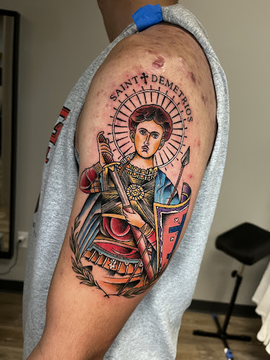 Explore toothless tattoo ideas, creative tattoo ideas in Ocoee, available at Fine Ink Studios Tattoos