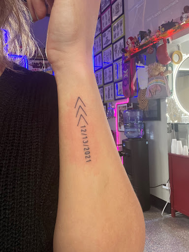 Explore neck tattoo ideas for women, creative tattoo ideas in Meridian, available at Burn The Boats Tattoo