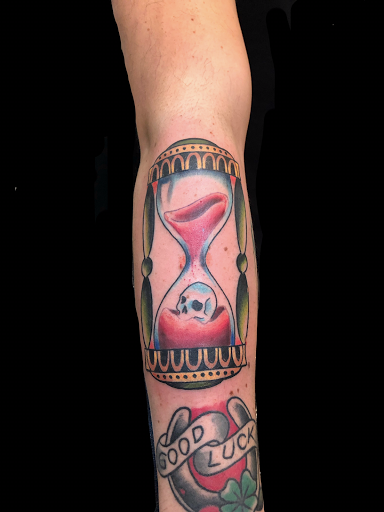 Explore lower arm half sleeve tattoo ideas, creative tattoo ideas in Addison, available at Cat Tattoo