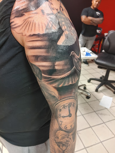 Explore family tree sleeve tattoo ideas, creative tattoo ideas in Hereford, available at Slow Pain Tattoo Body Art Studio