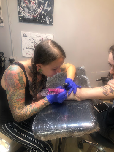 Explore triskelion tattoo ideas, creative tattoo ideas in Fort Wayne, available at Grade A Tattoos and Body Piercing