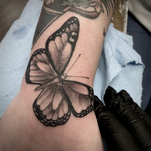 Explore scuba diver tattoo ideas, creative tattoo ideas in Buffalo, available at True Gloom Tattoo Studio