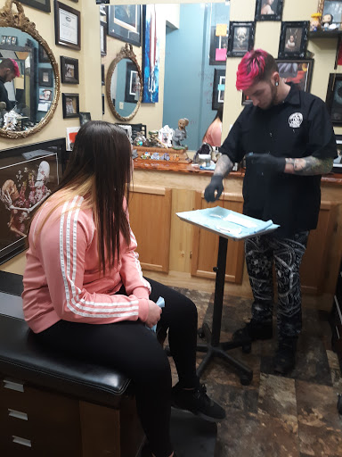 Explore middle arm tattoo ideas, creative tattoo ideas in Rochester, available at Sacred Heart Studios