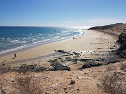 Esmeralda Norte Plajı'in fotoğrafı düz bir kıyı şeridi ile birlikte