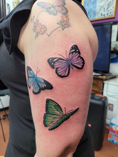 Explore tattoo ideas chest and arm, creative tattoo ideas in Placerville, available at Royal Six Tattoo