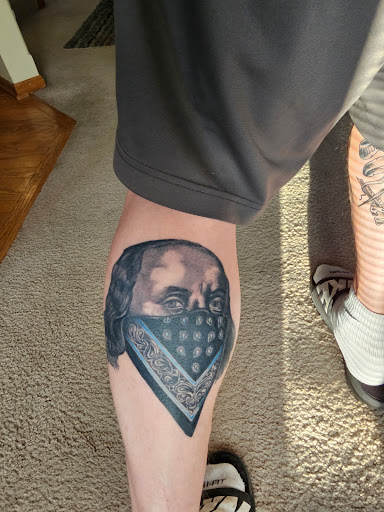 Explore chess piece tattoo ideas, creative tattoo ideas in Omaha, available at Grinn & Barrett Tattoo