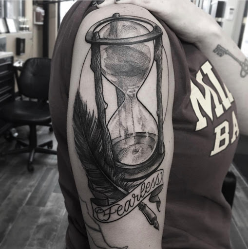 Explore tattoo collage ideas, creative tattoo ideas in Lakeville, available at SharkTooth Tattoo & Gallery