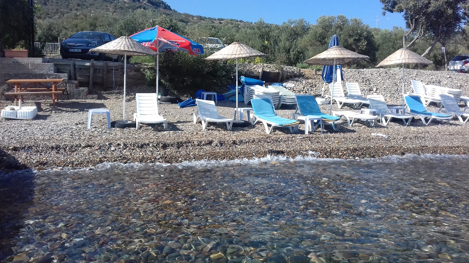 Fotografija Gunes Cafe beach z ravna obala