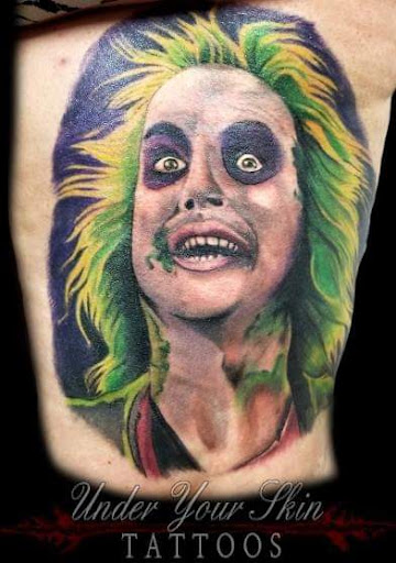 Explore belly button tattoo ideas, creative tattoo ideas in Green Cove Springs, available at Under Your Skin Tattoos