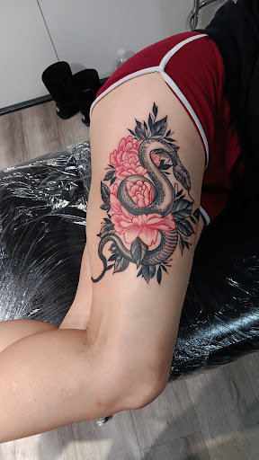 Explore tinkerbell tattoo ideas, creative tattoo ideas in Twin Falls, available at WarmArt Tattoo & BodyPiercing,LLC