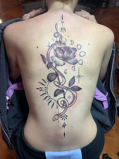 Explore blackout hand tattoo ideas, creative tattoo ideas in Coeur D Alene, available at Jojos Tattoo & Body Piercing
