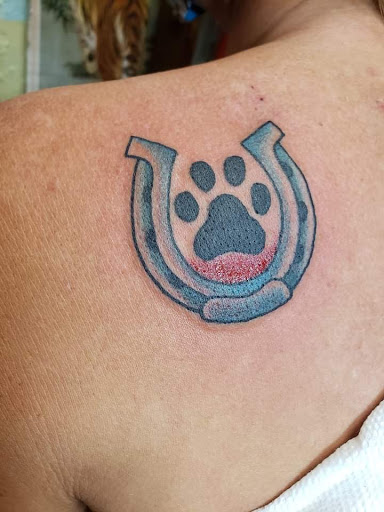 Find tattoo ideas for stepson for your next unique tattoo in Clearwater at Moniques Body Art