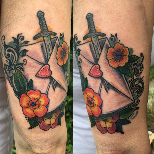 Explore angel tattoo ideas, creative tattoo ideas in Milford, available at Golden Hammer Tattoo Studios