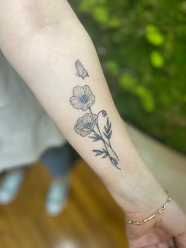 Explore tattoo flower ideas, creative tattoo ideas in Sandy Spring, available at Tantric Tattoo Boutique