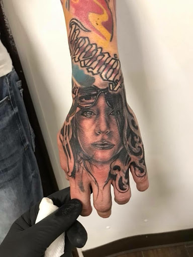 Explore bookworm tattoo ideas, creative tattoo ideas in Jeffersonville, available at Spring St. Tattoo