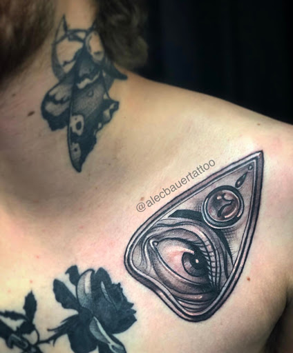 Explore male flower tattoo ideas, creative tattoo ideas in Dubuque, available at First Light Tattoo & Gallery