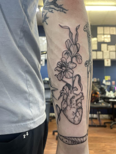 Explore bratz tattoo ideas, creative tattoo ideas in Cocoa, available at Rorschach Tattoo Shop and Piercing Studio