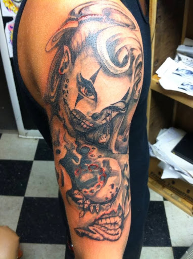 Explore shoulder scar tattoo ideas, creative tattoo ideas in Jackson, available at T.R.A.P. Ink Tattoos and Piercings