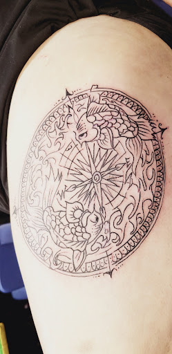 Explore meaningful elegant spine tattoo ideas, creative tattoo ideas in Englewood, available at The Original Big Daddy Tattoo & Body Piercing est.1997 est.1997