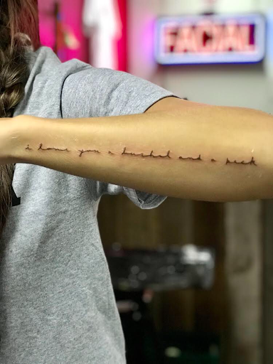 Explore tribal cross tattoo ideas, creative tattoo ideas in Snohomish, available at Collective Image Tattoo