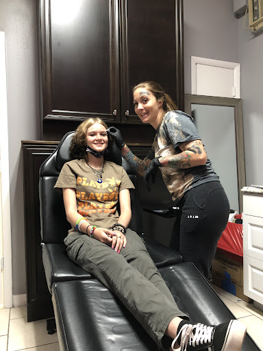 Explore small halloween tattoo ideas, creative tattoo ideas in Ocoee, available at Slaughterized Ink Tattoo and Piercing Studio