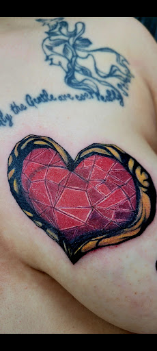 Explore hook tattoo ideas, creative tattoo ideas in Benton, available at Spectrum Tattoo