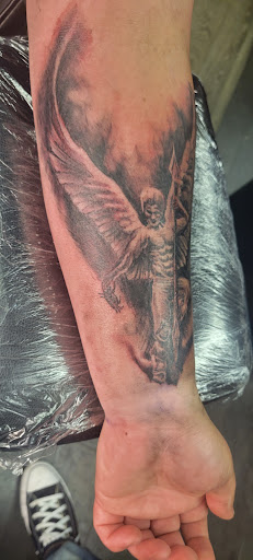 Explore tattoo cover up ideas shoulder, creative tattoo ideas in Las Vegas, available at Work of Art Tattoo and Piercing