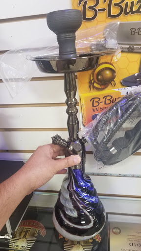 Gold Dealer «RUMMANA GOLD BUYER AND TOBACCO INC./ Sam Smoke Shop», reviews and photos, 2126 N University Dr, Sunrise, FL 33322, USA