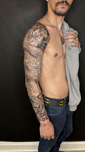 Explore tattoo ideas ribs, creative tattoo ideas in Miami, available at Bonsai Mike Tattoos