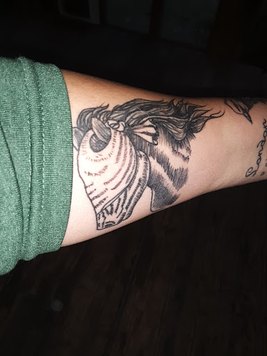 Explore aztec tattoo sleeve ideas, creative tattoo ideas in Foley, available at Symbolic Ink Tattoo Studio