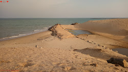 Foto de Thoppuvilai Beach com linha costeira longa e reta